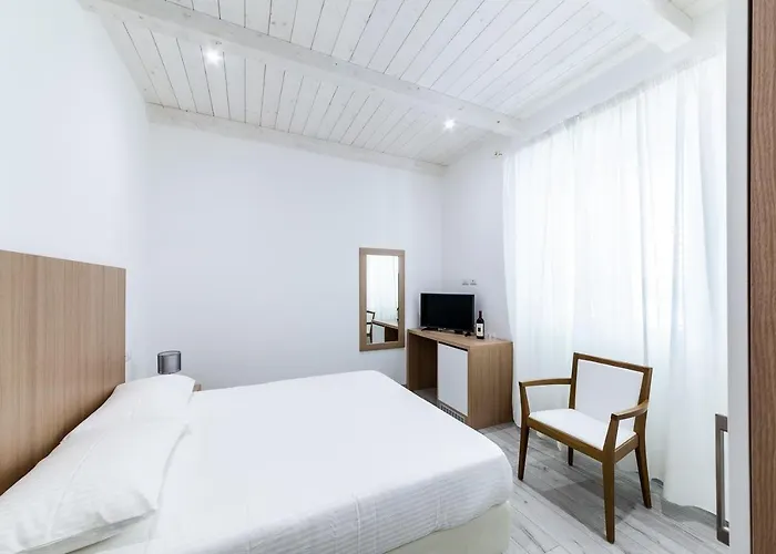 Pensión La Promenade Rooms&suites